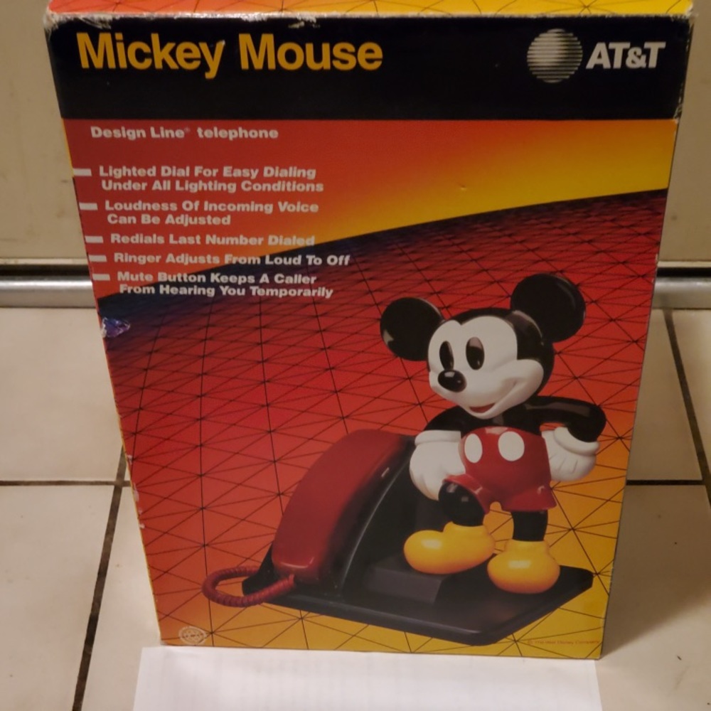 Mickey Mouse and AT&T landline phone